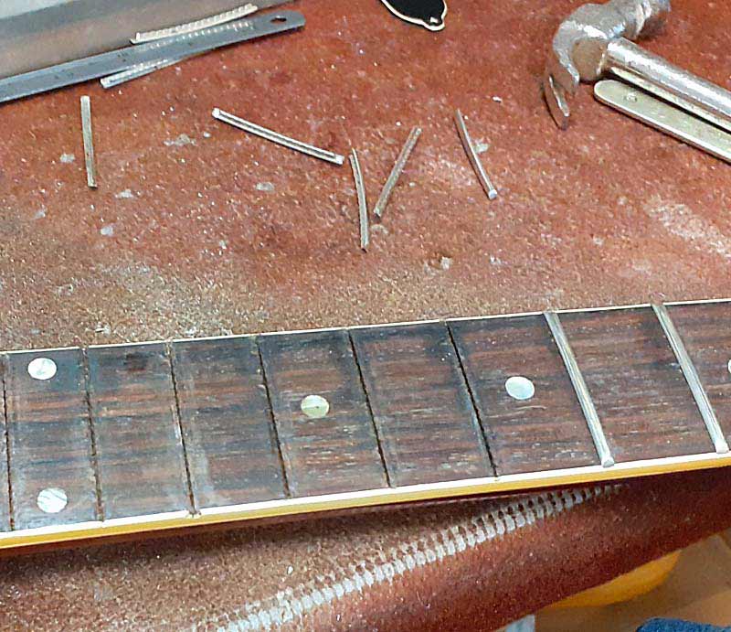 Fretwork Replacing frets in the workshop.
